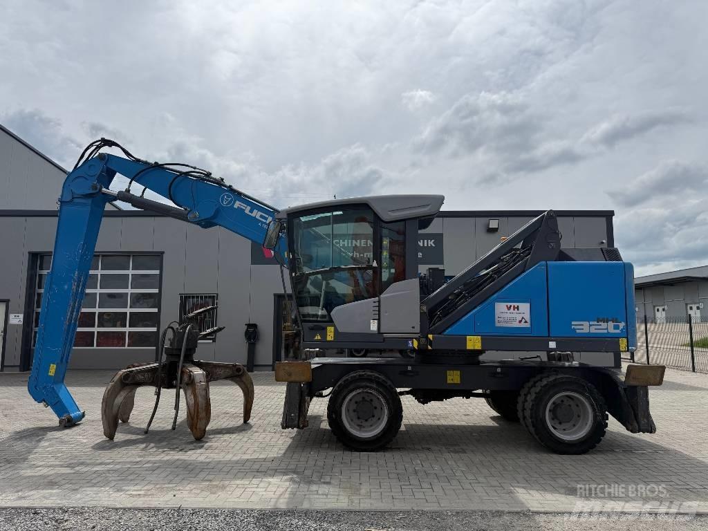 Fuchs MHL 320 Оператори на отпадъци/индустрия
