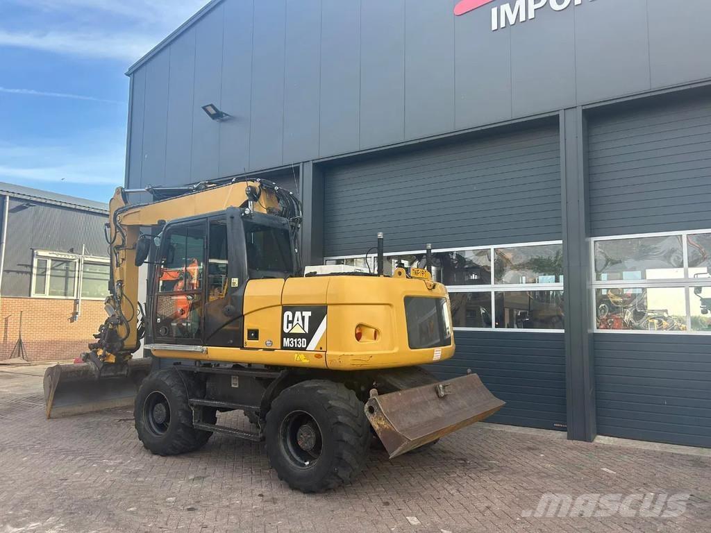 CAT M313D Колесни екскаватори