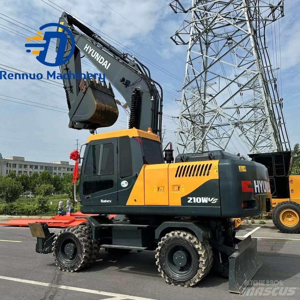 Hyundai 210W-9 Колесни екскаватори