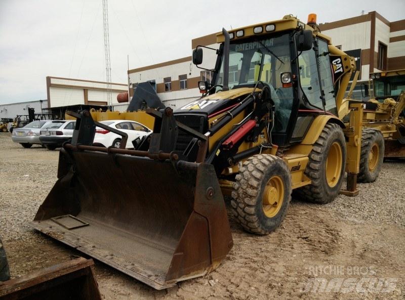 CAT 428E Товарач със заден ексватор