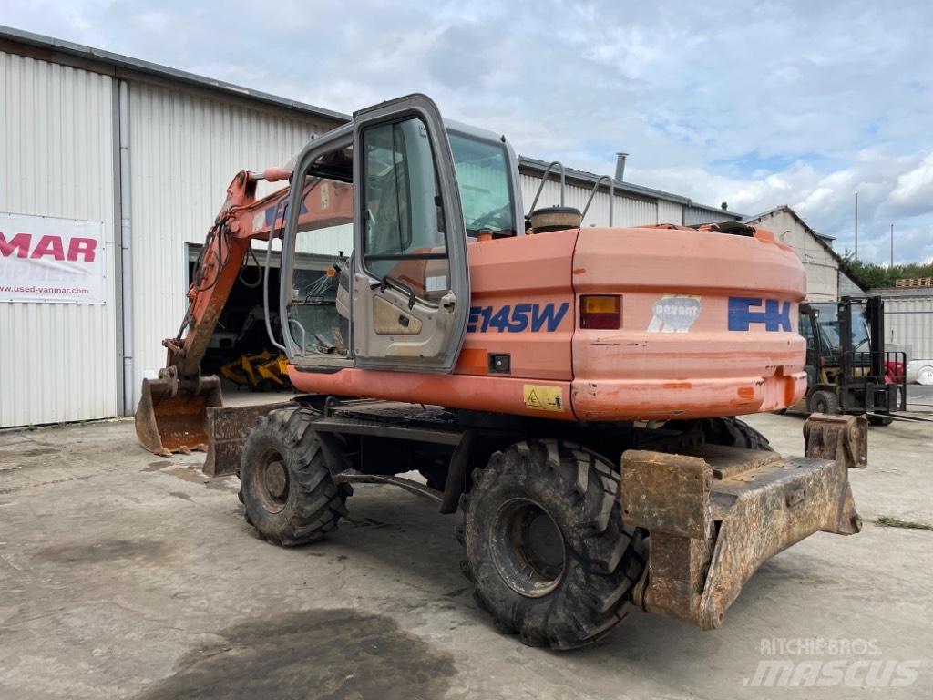 Kobelco E145W Колесни екскаватори