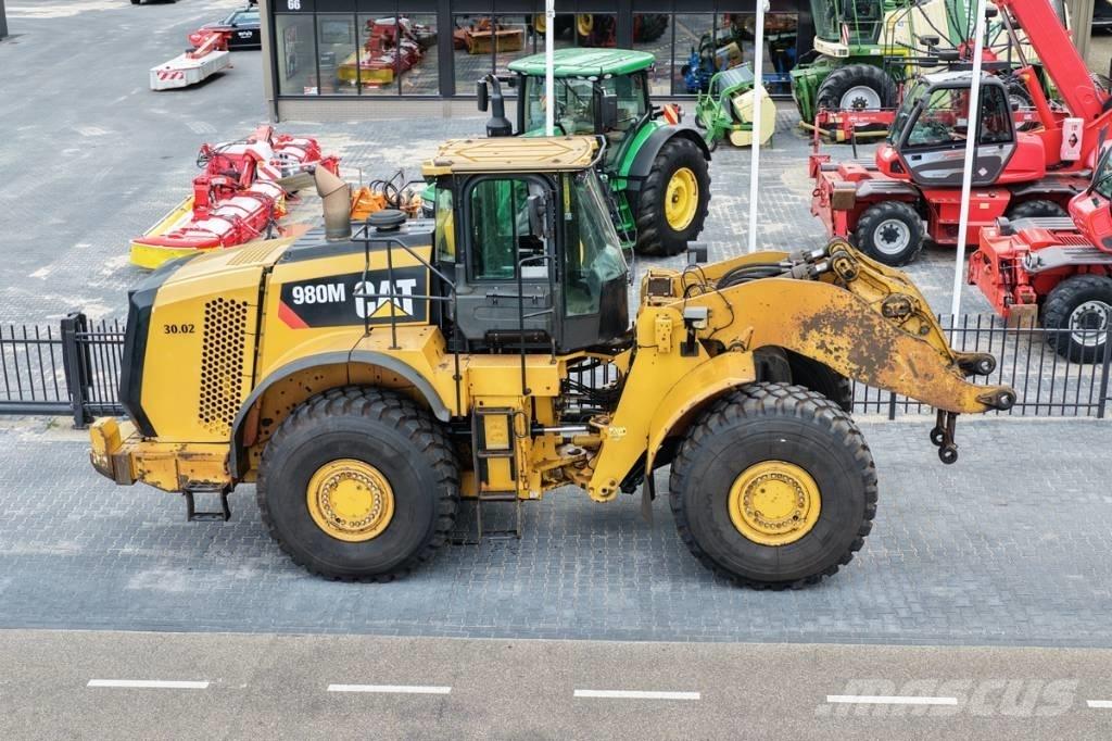 CAT 980M shovel + Bak Колесни товарачи