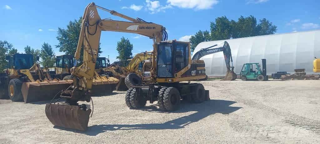 CAT M 315 Колесни екскаватори