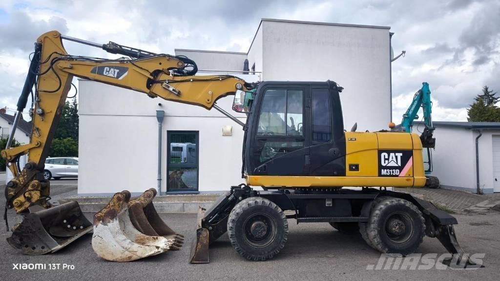CAT M 313 D Колесни екскаватори