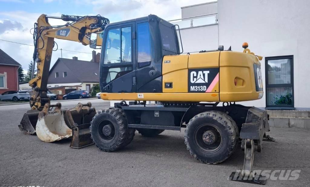 CAT M 313 D Колесни екскаватори