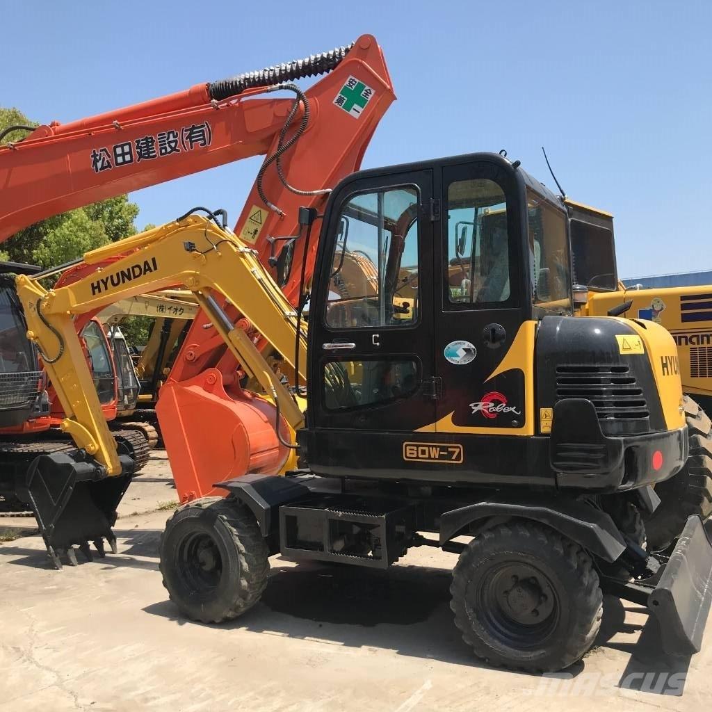 Hyundai 60 W Колесни екскаватори
