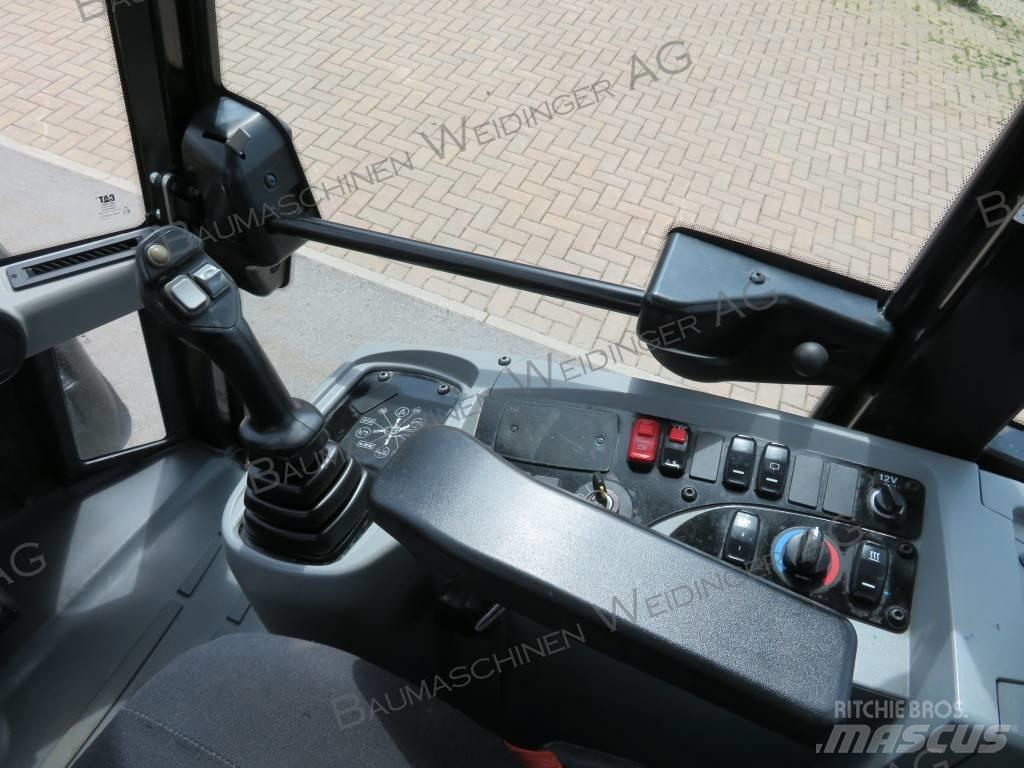 CAT 906M Колесни товарачи