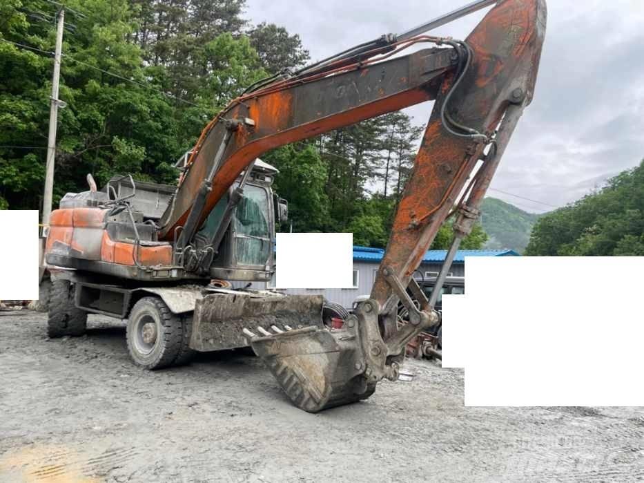 Doosan DX 210 W Колесни екскаватори