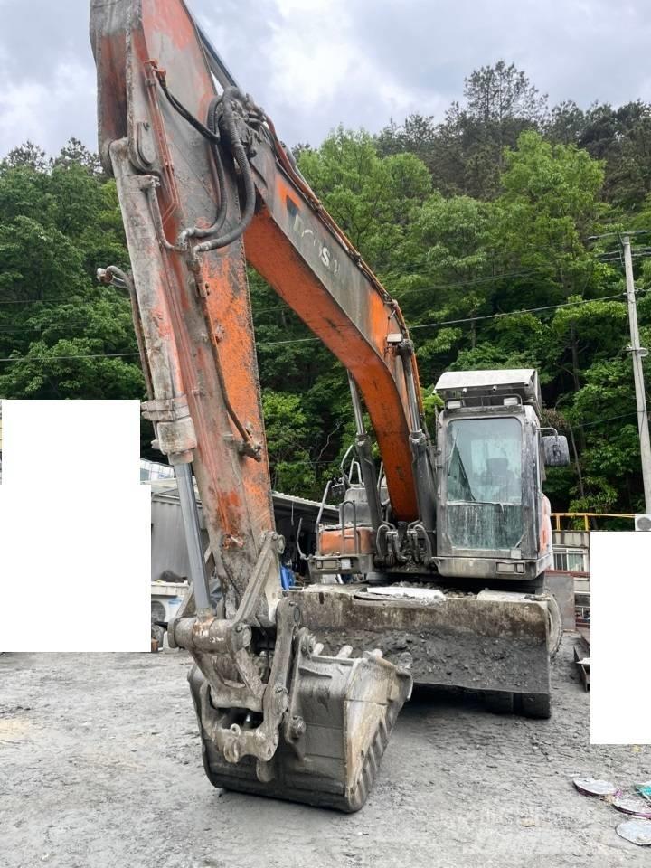 Doosan DX 210 W Колесни екскаватори