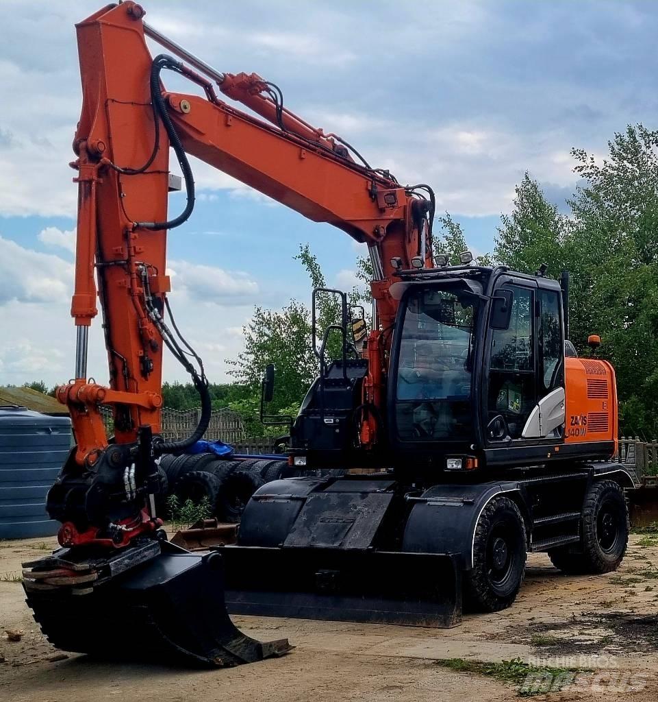 Hitachi 140W Колесни екскаватори