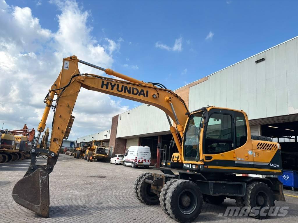 Hyundai 140W-9 Колесни екскаватори