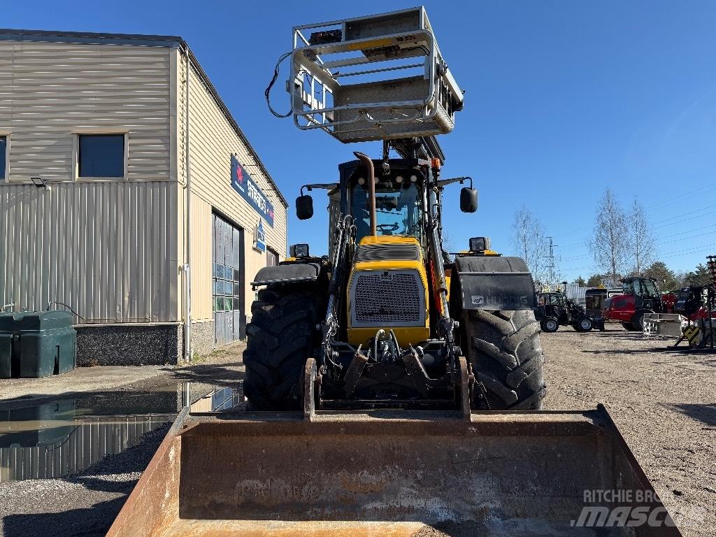 Huddig 1260 C Товарач със заден ексватор