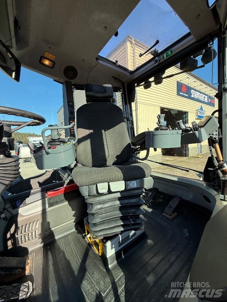 Huddig 1260 C Товарач със заден ексватор