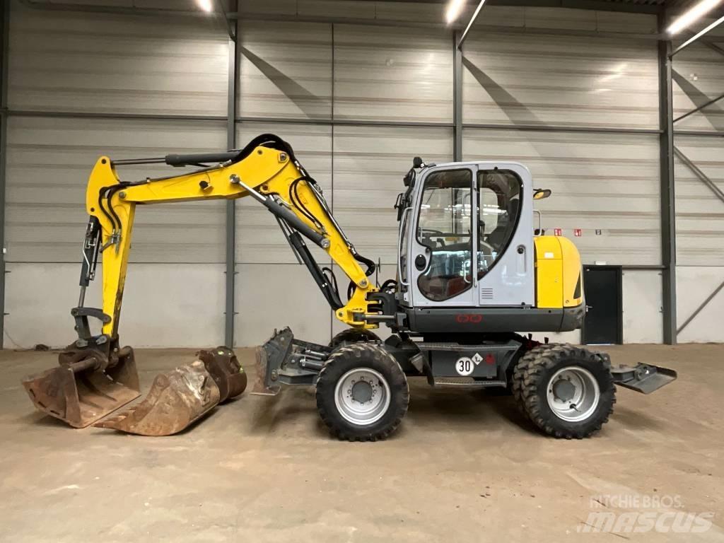 Neuson EW 100 Колесни екскаватори