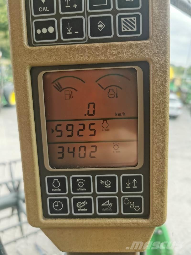 John Deere T560 Комбайни