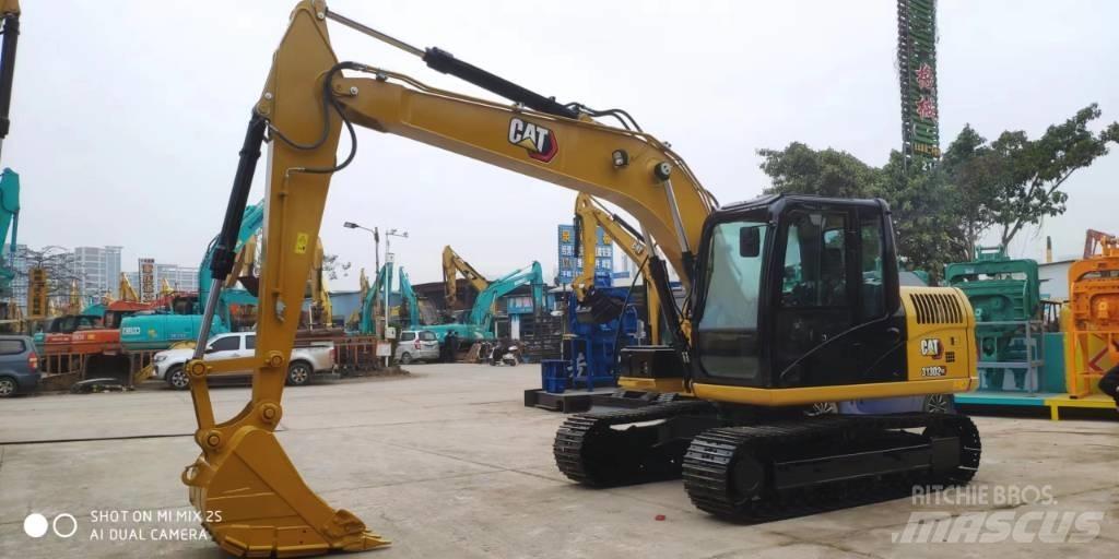 CAT 2021 CAT 313D2GC Колесни екскаватори