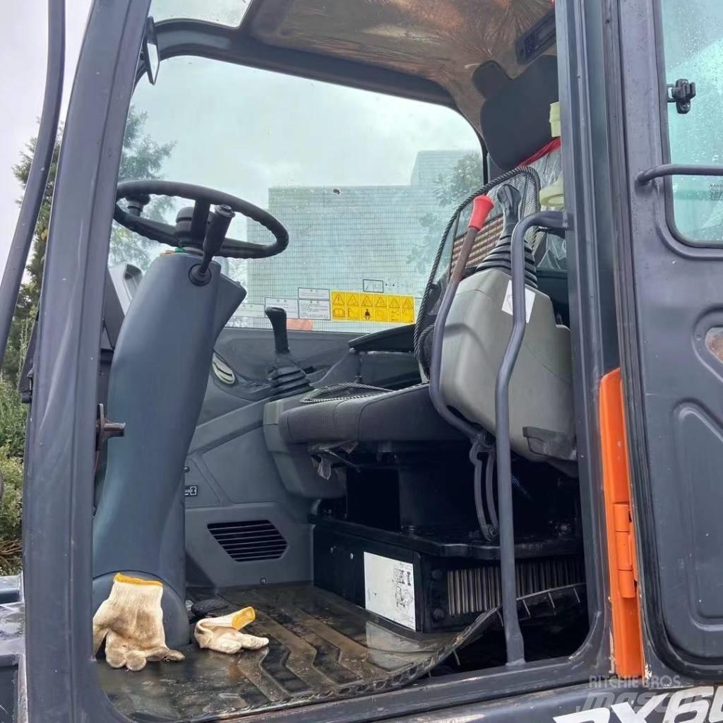 Doosan DX60W Колесни екскаватори