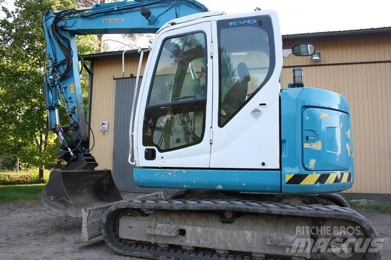  New Hollan E 70 BSR Средни екскаватори 7т - 12т