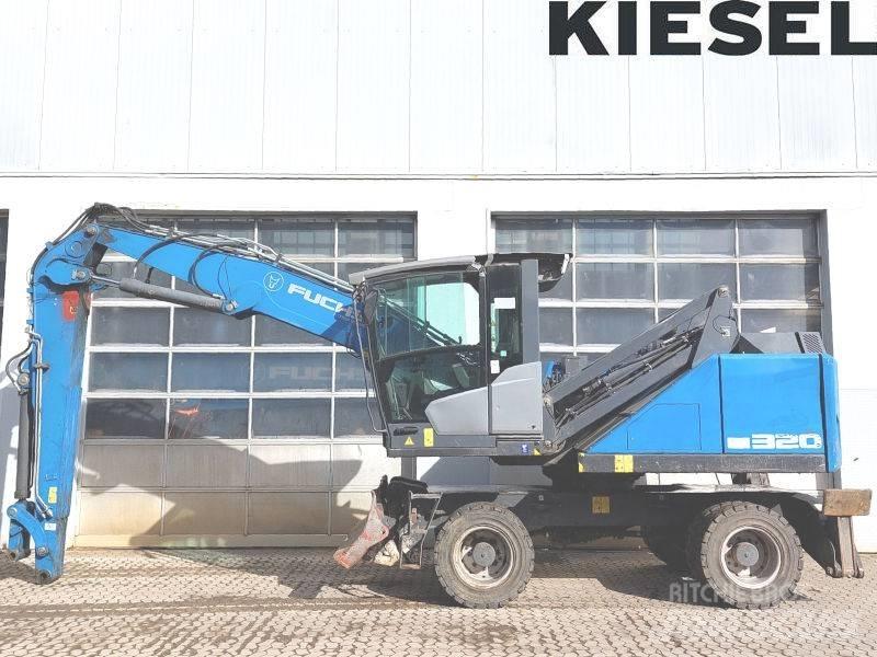 Fuchs MHL 320 F Оператори на отпадъци/индустрия
