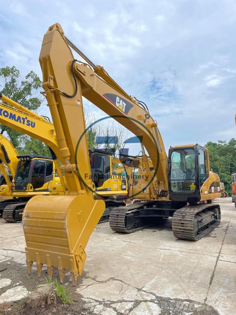 CAT 320C Средни екскаватори 7т - 12т
