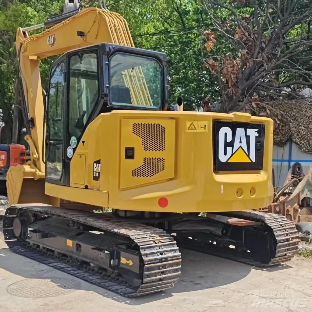 CAT 310 Средни екскаватори 7т - 12т