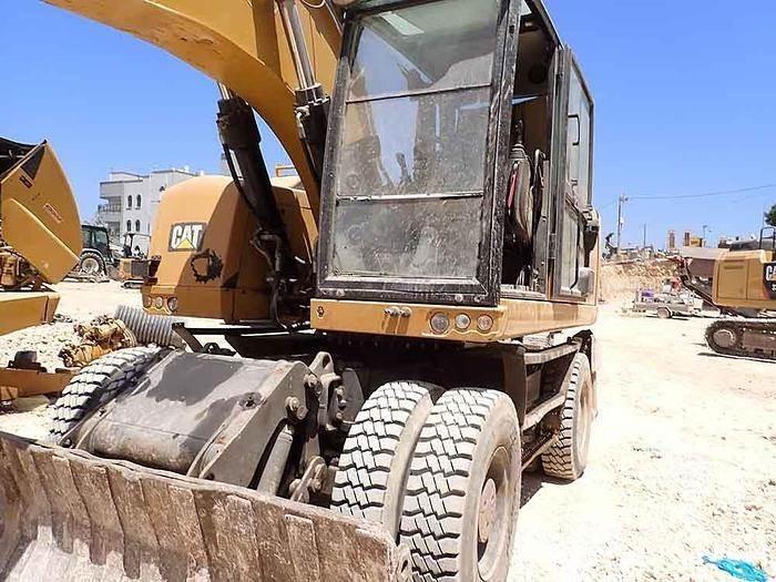 CAT M320F Специални екскаватори