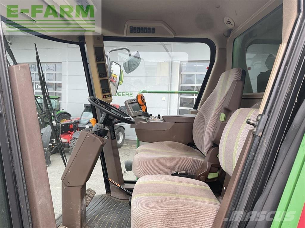 John Deere t560hm Комбайни