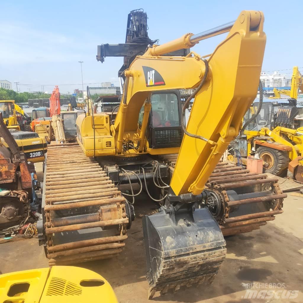 CAT 320C Багери амфибии