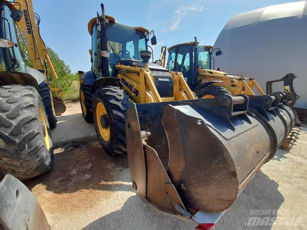 Komatsu WB97S-8 Товарач със заден ексватор