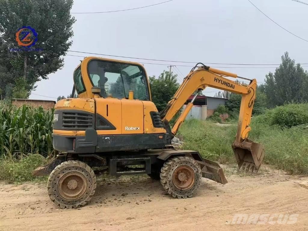 Hyundai 60 W Колесни екскаватори
