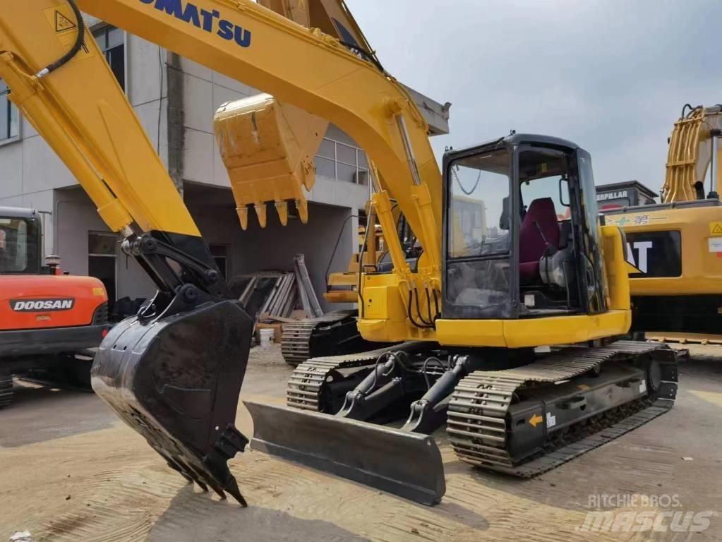 Komatsu PC 128US Средни екскаватори 7т - 12т