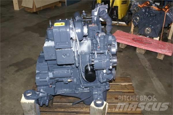 Komatsu S6D102E Двигатели