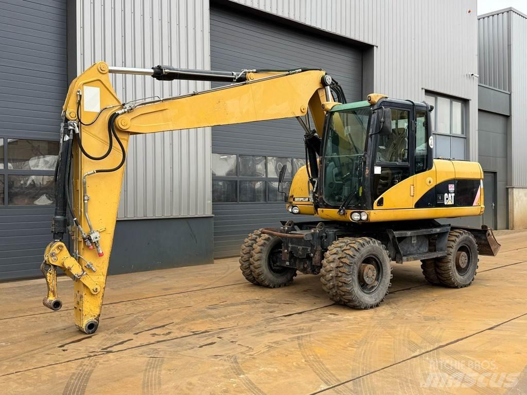 CAT M315D Колесни екскаватори