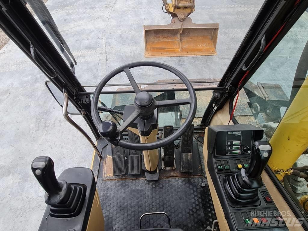 CAT M 312 Колесни екскаватори
