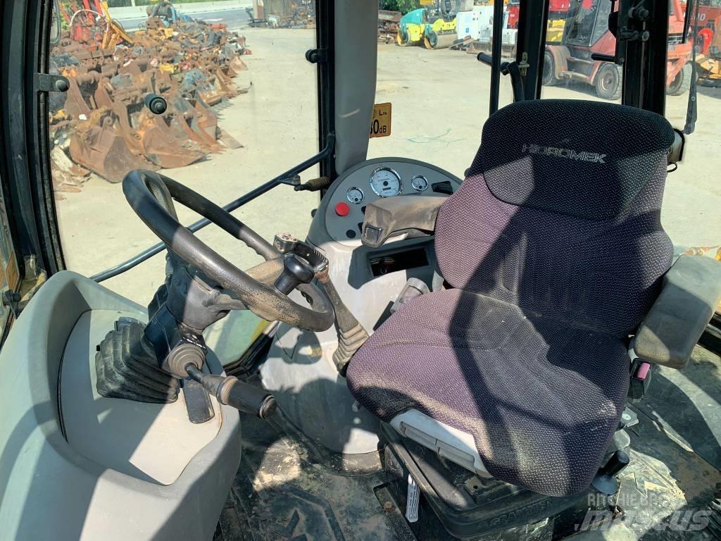Hidromek HMK 102 Товарач със заден ексватор