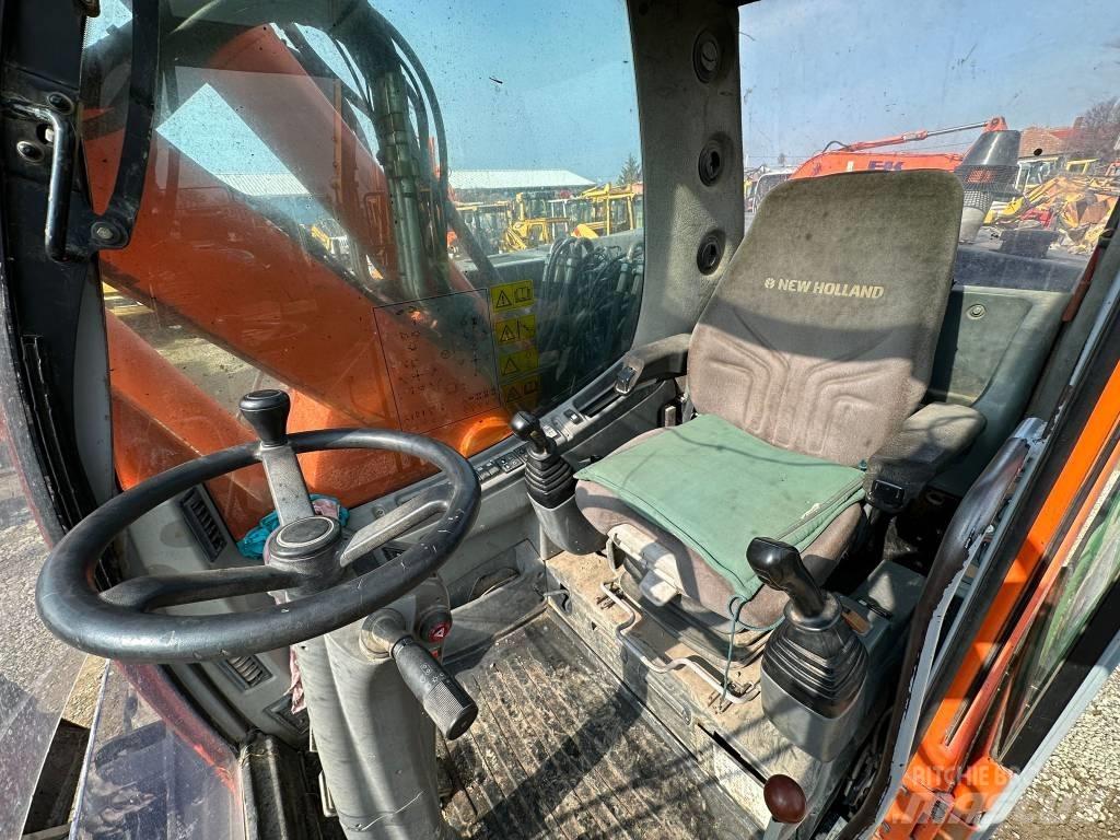 New Holland MH Plus Колесни екскаватори