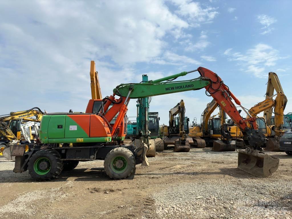 New Holland MH Plus Колесни екскаватори