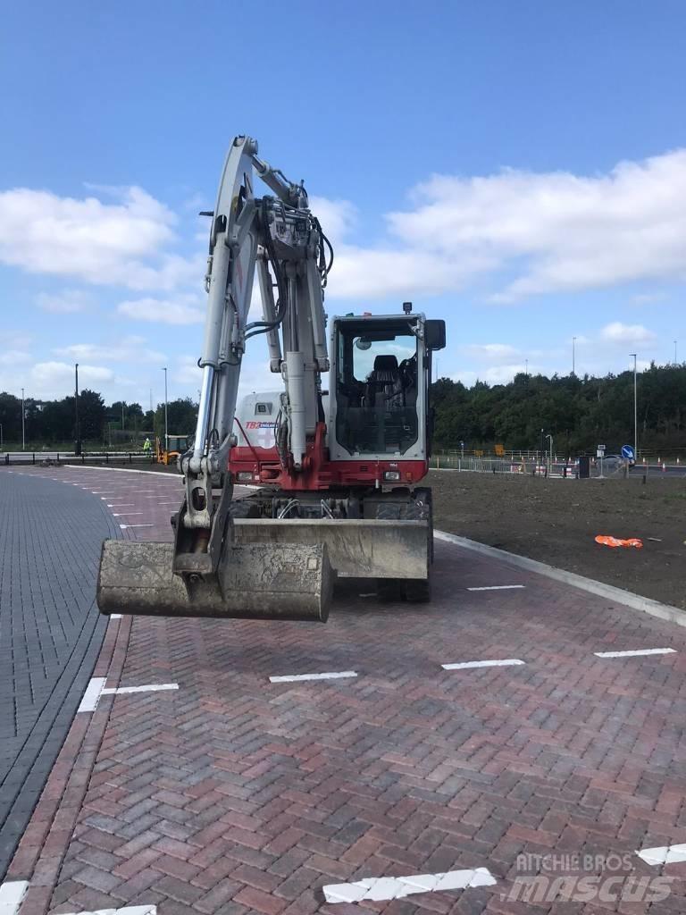 Takeuchi TB295W Колесни екскаватори