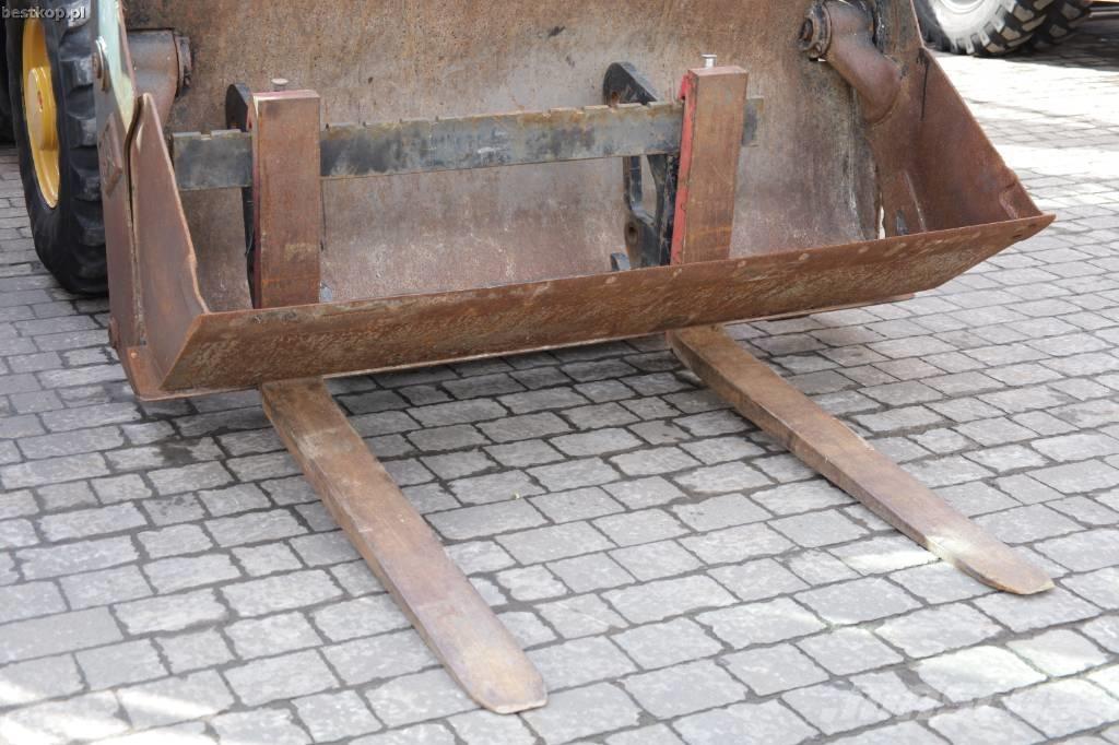 CAT 906M Колесни товарачи