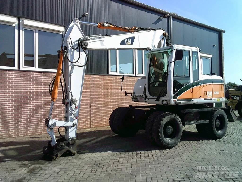 CAT M313D Колесни екскаватори