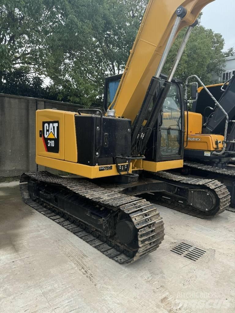 CAT 310 Еднобарабанни ролки
