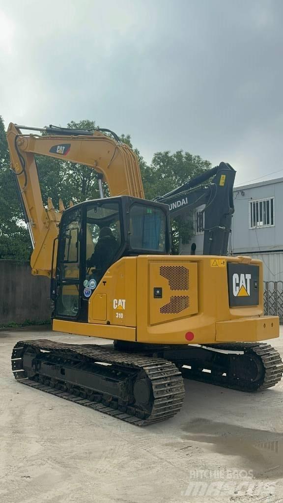 CAT 310 Еднобарабанни ролки
