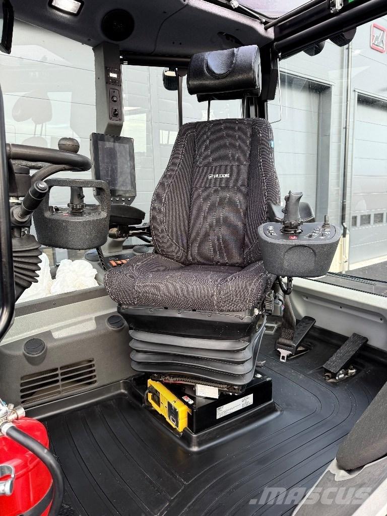 Huddig 1370 Товарач със заден ексватор