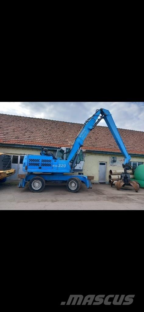 Fuchs MHL 320 Колесни екскаватори