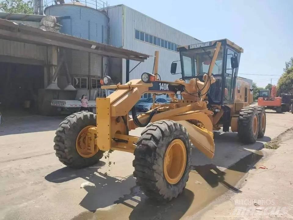 CAT 140K Грейдери
