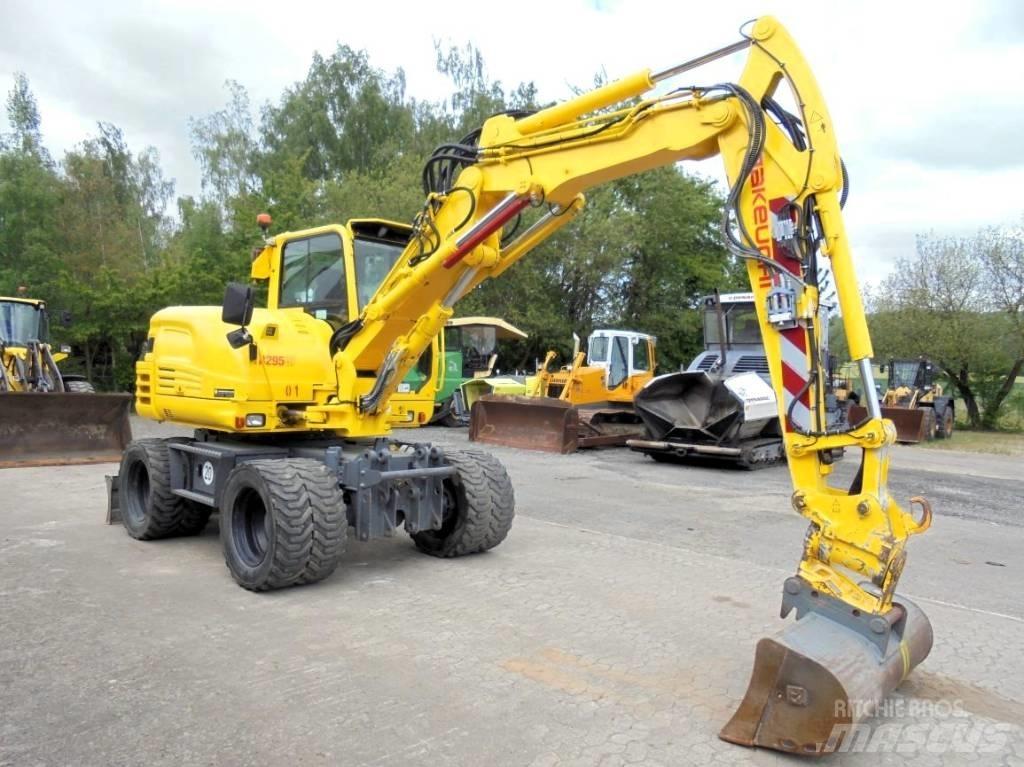 Takeuchi TB 295 W-2 Колесни екскаватори