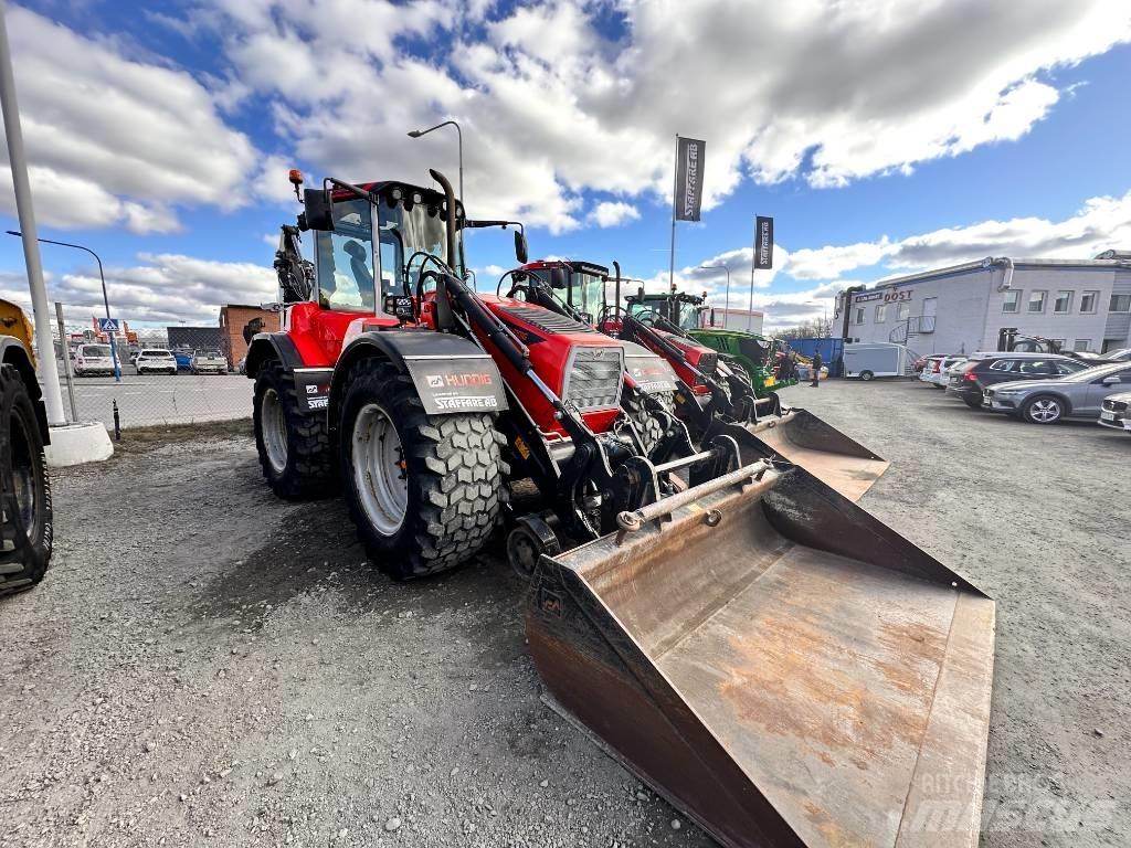 Huddig 1260 C Товарач със заден ексватор