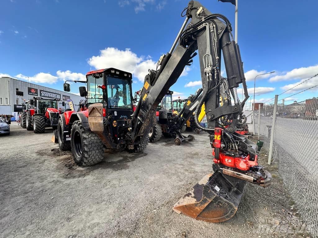 Huddig 1260 C Товарач със заден ексватор