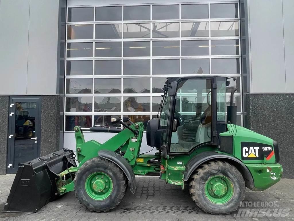 CAT 907H Колесни товарачи