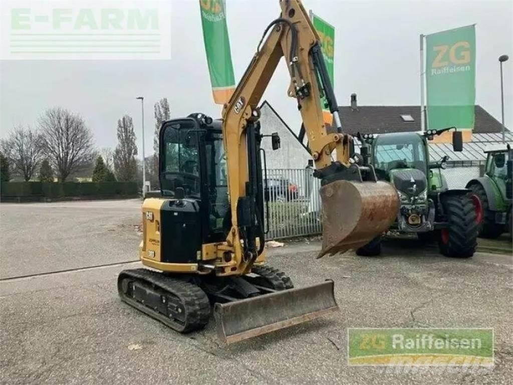 CAT 303 minibagger Колесни екскаватори
